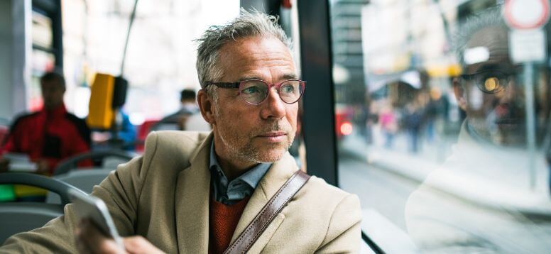 Businessman Traveling by Bus