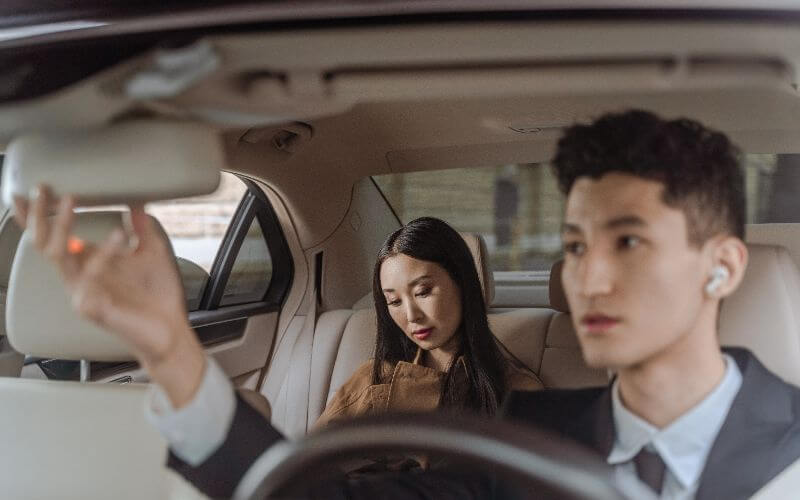Photo by Ron Lach from Pexels: https://www.pexels.com/photo/man-suit-woman-car-9519968/