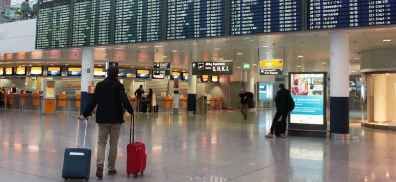 Man with Suitcases at Munich Airport